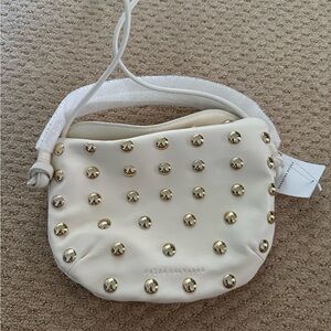 Freda Salvador White and Gold Crossbody Bag with Studded Design Mini Crescent